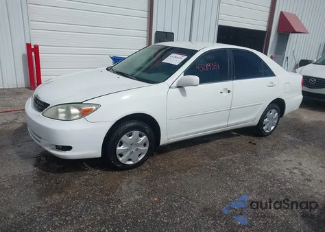 2002 Toyota Camry Le from USA, damaged, VIN 4T1BE32K12U093855